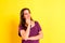 Normal young woman with relaxing meditative gesture dressed casual,  on studio background