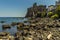 The Norman castle and rocky shoreline of Acicastello, Sicily