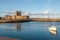 Norman castle and yacht in Carrickfergus near Belfast