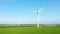 Norman wind turbines in the middle of flax and barley fields