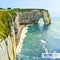 Normandy, Northern France, Europe. Spectacular natural cliffs Aval of Etretat and beautiful coastline. Stone arch. Landscape. Vect