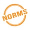 NORMS text written on orange grungy round stamp