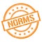 NORMS text written on orange vintage stamp