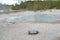 NORRIS JUNCTION, WYOMING - JUNE 7, 2017: Crater Spring in the Back Basin Area of Norris Geyser Basin in Yellowstone National Park