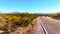 North Bush Highway winding through the semi-desert of Four Peaks Wilderness in Arizona