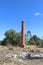 The North Deborah Gold Mine 1937-1954 poppet head and chimney are the only visible surface remains at the site