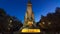 North-eastern side of the Cervantes monument timelapse hyperlapse on the Square of Spain in Madrid day to night