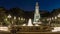 North-eastern side of the Cervantes monument timelapse on the Square of Spain in Madrid at night