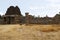 North Gopura of the inner courtyard and ruins of a mandapa on the right side, Achyuta Raya temple, Hampi, Karnataka. Sacred Center