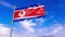 North Korea flag waving against blue sky, perfect for news, digital composition