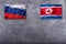 North Korea and Russia flags. North Korea and Russia flag on con