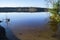 North lake in autumn forest with reflection in water