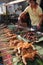 North Laos: Grilled fish and meat at the market of Luang Prabang City.
