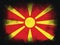 North Macedonia Flag design composition of exploding powder and paint, isolated on a black background for copy space. Colorful