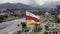 North Ossetia flag aerial view. Vladikavkaz city, Terek river, amazing mountains and hills.