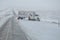 NORTH PLATTE, NEBRASKA - FEBRUARY 25, 2010 - Towing truck gets ready to pull a FedEx trailer out the icy highway