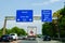 North Rhine-Westphalia, Germany - August 2, 2019: Road traffic on the German autobahn 1 with road signs. Cars ride on the German