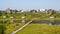 North Russian village. Summer day, river, old cottages on coast.