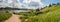 North Russian village. Summer day, river, old cottages on coast.