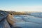 North sea beach view with breakwater structures, Aberdeen, Scotland