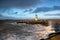 North sea waves and lighthouse in Ijmuiden