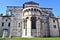 North side of the cathedral of Lucca touched by the inclined sun of the morning and in the background of the blue sky.