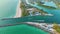 North and South Jetty on Nokomis beach near Venice, Florida. Aerial view of sea shore with white yachts floating on sea