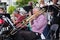 NORTH VANCOUVER, BC, CANADA - JUNE 9, 2019: A jazz band ensemble playing woodwind and brass instruments with a conductor