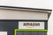 Northampton UK January 23 2018: Amazon Logistics Marketplace logo sign on warehouse wall in Grange Park Industrial