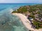 Northern Coast of Zanzibar at Nungwi with Lighthouse and Thatched-roof Restaurant on Pillars Above the Ocean