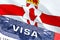 Northern Ireland Visa Document, with Northern Ireland flag in background. Northern Ireland flag with Close up text VISA on USA