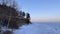 Northern landscape of frozen Lake Baikal, Olkhon island. Ice hummocks of Lake Baikal covered with snow