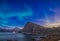 Northern lights above Mt. OffersÃ¸ykammen in Lofoten, northern Norway