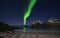 Northern lights above Mt. Veggen in Lofoten, northern Norway