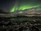 Northern Lights (Aurora Borealis) above the Arctic fjord