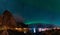 Northern Lights Aurora Borealis with classic view of the fisherman s village of Reine near Hamnoy in Norway, Lofoten