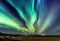 Northern lights, Aurora Borealis in the night sky, Iceland. These colourful curtains of dancing lights can illuminate the night