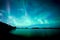 Northern lights dancing over calm lake aurora borealis