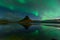 Northern lights in Iceland. Landscape full of kp5 Aurora Borealis. Amazing nightscape at Kirkjufell, scenic travel destination. Gr