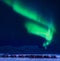 Northern lights in the mountains house of Svalbard, Longyearbyen city, Spitsbergen, Norway wallpaper