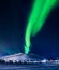 Northern lights in the mountains house of Svalbard, Longyearbyen city, Spitsbergen, Norway wallpaper