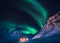 Northern lights in the mountains house of Svalbard, Longyearbyen city, Spitsbergen, Norway wallpaper