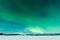 Northern Lights over moon lit frozen Lake Laberge