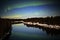Northern lights over Skellefte River in Swedish lapland