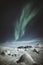 Northern lights over snowy Greenland
