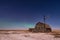 Northern Lights over vintage barn, bins and windmill in Saskatchewan
