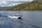 The NorthSilver PRO 745 Cabin boat of the transport police is patrolling the waters of Lake Teletskoye. Altai Republic