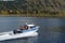 The NorthSilver PRO 745 Cabin boat of the transport police is patrolling the waters of Lake Teletskoye. Altai Republic