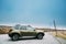 Norway. Car Renault Duster SUV Parked Hardangervidda Scenic Route Road In Norwegian Countryside Landscape.