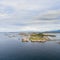 Norway coast with island in summer aerial drone view